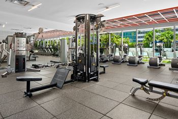 Fitness center with yoga and spin rooms